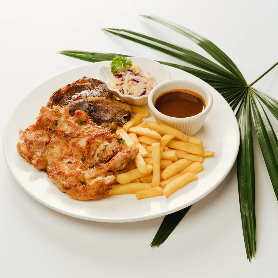 Grilled chicken and lamb combo with fries, coleslaw and black pepper sauce