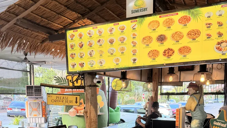 Big Coconut Hui Sing — menu board above the counter